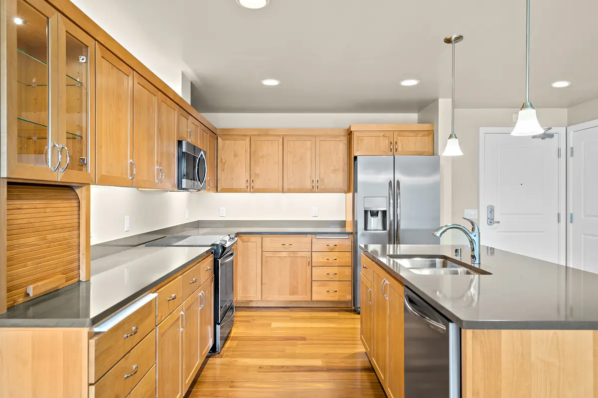 Kitchen view with wood cabinets and details